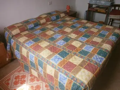 Letto o letti in una camera di Residenza Li Fureddi