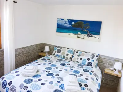 Letto o letti in una camera di B&B Tavolara
