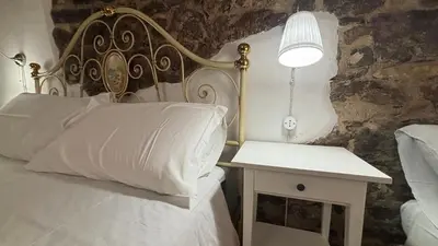 Letto o letti in una camera di A Casa di Nonno tra mare e montagna AC WiFi