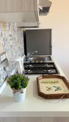 Cucina o angolo cottura di A Casa di Nonno tra mare e montagna AC WiFi