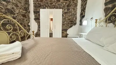 Letto o letti in una camera di A Casa di Nonno tra mare e montagna AC WiFi