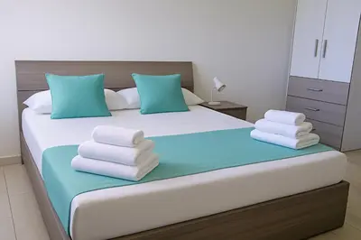 Letto o letti in una camera di La Smeralda - Boutique Rooms and Breakfast