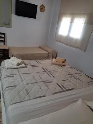 Letto o letti in una camera di Casa Toloi