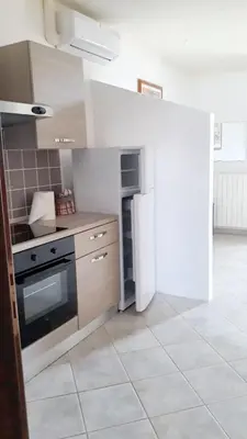 Cucina o angolo cottura di Charming Apartment in Galtellì
