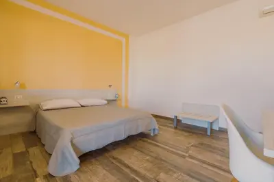 Letto o letti in una camera di Borgo Albador Rooms