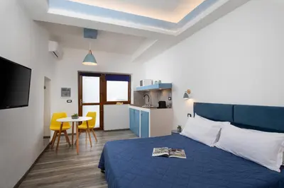 Letto o letti in una camera di OlbiaLoft
