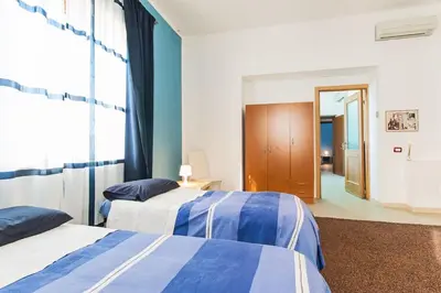 Letto o letti in una camera di MARY HOUSE