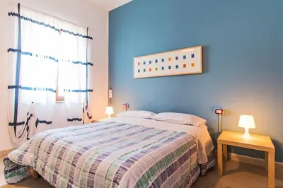 Letto o letti in una camera di MARY HOUSE