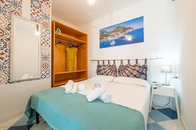 Letto o letti in una camera di Monolocale Marizzola