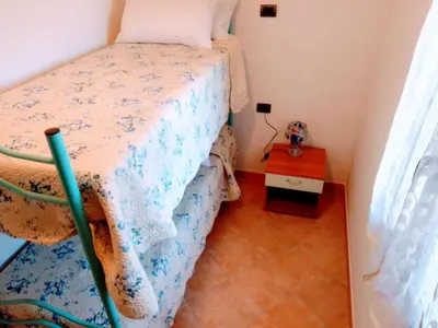 Letto o letti in una camera di Residenza Rosa Maria
