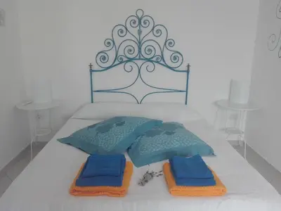 Letto o letti in una camera di Le pavoncelle blu
