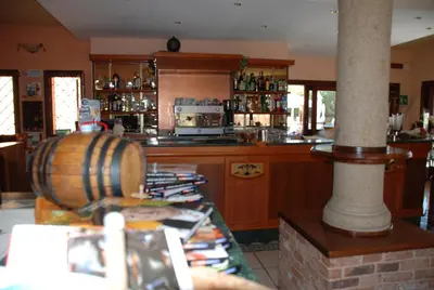 Salone o bar di Residence Li Troni
