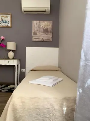 Letto o letti in una camera di Domus Regia