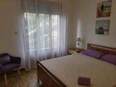 Letto o letti in una camera di App.Violet Sardegna Mare La Caletta