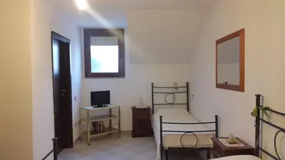 TV o dispositivi per l'intrattenimento presso Affittacamere Peonia