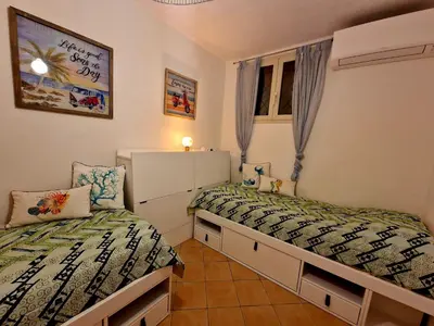 Letto o letti in una camera di VILLA SABA