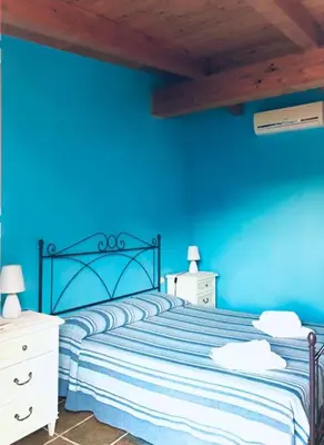 Letto o letti in una camera di Trasicca B&B