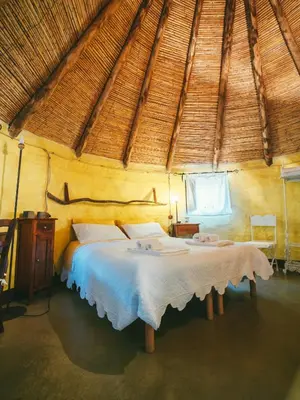 Letto o letti in una camera di Essenza Sardegna
