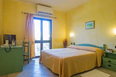 Letto o letti in una camera di Camere Magnolia