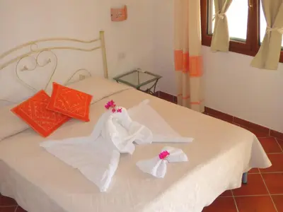 Letto o letti in una camera di Agriturismo La Rocca Manna