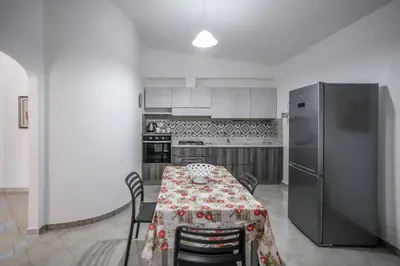 Cucina o angolo cottura di Giardino Dei Limoni Apartment
