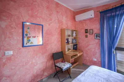 Letto o letti in una camera di Giardino Dei Limoni Apartment