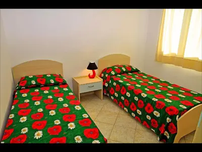 Letto o letti in una camera di Residenze Mare e Pineta