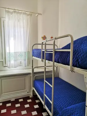Letto o letti in una camera di CASA GIULIA