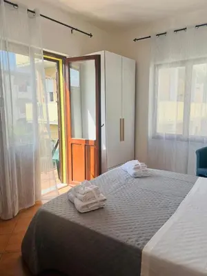 Letto o letti in una camera di Il Canarino affittacamere