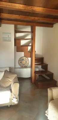 Letto o letti in una camera di Residenze Coda Cavallo