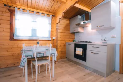 Cucina o angolo cottura di Chalet Sa Petra Ruja - Gadu e Tremene