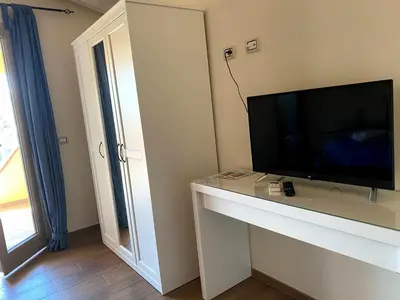 TV o dispositivi per l'intrattenimento presso Janas B&B