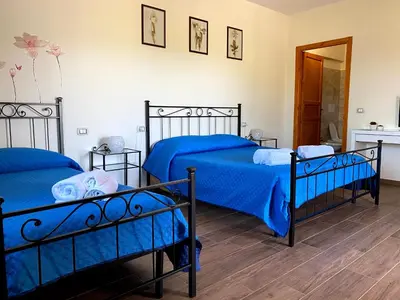 Letto o letti in una camera di Janas B&B