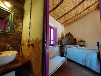 Letto o letti in una camera di holiday home su Niberalzu