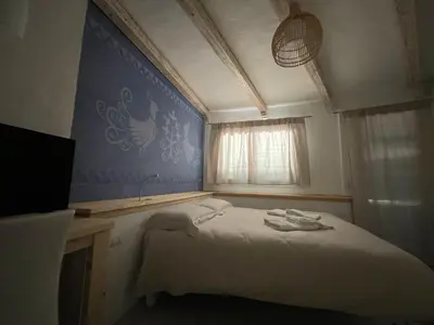 Letto o letti in una camera di Domus de Diana