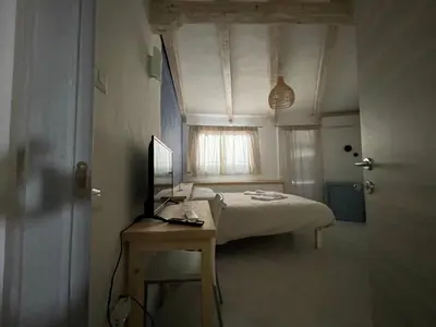 Letto o letti in una camera di Domus de Diana