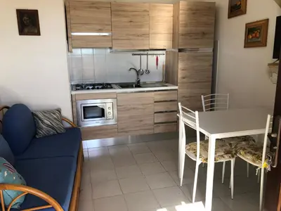 Cucina o angolo cottura di Appartamento Iris 300 mt spiaggia