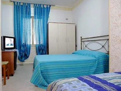 Letto o letti in una camera di Affittacamere il Laghetto