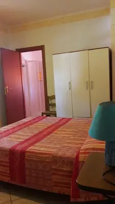 Letto o letti in una camera di Affittacamere il Laghetto