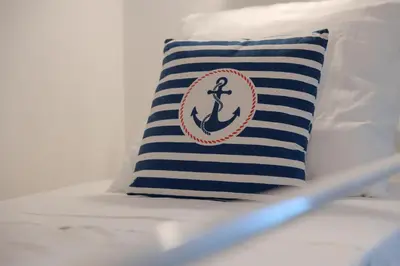 Letto o letti in una camera di Appartamenti Le Magnolie