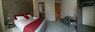Letto o letti in una camera di Casa Orrù