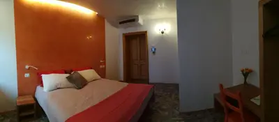 Letto o letti in una camera di Casa Orrù