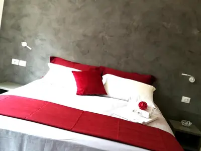 Letto o letti in una camera di Casa Orrù