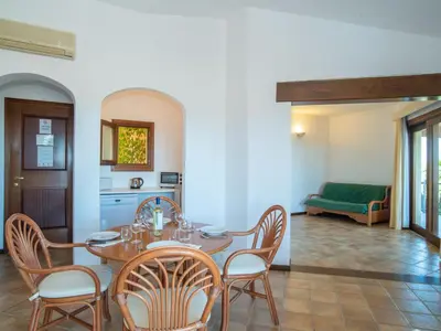 Cucina o angolo cottura di Holiday Home Corbezzolo 8 - Vista Village by Interhome