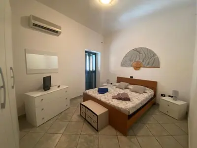 Letto o letti in una camera di La Casa di Marco