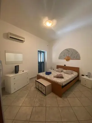 Letto o letti in una camera di La Casa di Marco