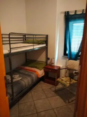 Letto o letti in una camera di La Casa di Marco