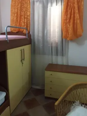 Letto o letti in una camera di Villa Pierina