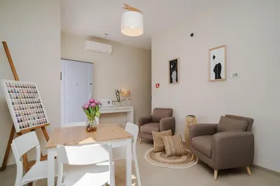 Area soggiorno di Enjoy Your Stay - Guest House - Olbia
