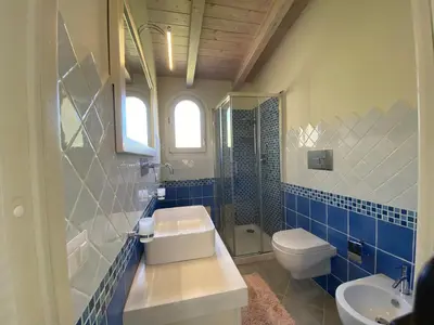 Bagno di Residence Il Borgo Del Mare - BUDONI SWEET HOME